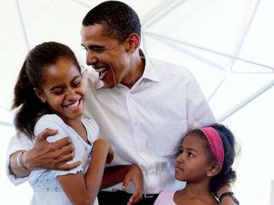 奥巴马和他的两个女儿 奥巴马和他的两个女儿